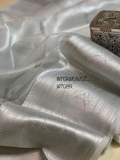 DISCRIPTION Tissue Saree Banarasi Silk Saree With Big Kanchi Border Saree Wedding Wear Girlish Bridal Sari Gift Indian Saree Festive Wear Running Blouse PRODUCT DETAILS Auction For: 1 Saree with Blouse Piece Color: As shown in the picture Condition: New Work: zari border Saree fabric : pure linen Saree length : 5.5 meters Blouse length : 0.8 meters Washing Instructions: Dry Clean Only Occasions: Wedding Wear, Party Wear, Festive Wear, Durga Puja, Indian Wear, Sangeet Wear, Bridal Wear, Chrismas Formal White Saree With Cutdana, White Cutdana Saree For Formal Occasions, Formal White Cutdana Saree, Formal White Saree With Zari Work, White Bollywood Saree For Formal Occasions, White Organza Traditional Wear For Formal Occasions, White Bollywood Style Formal Saree, Formal Bollywood White Saree, Celebration White Tissue Silk Blouse Piece