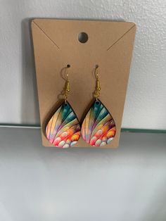 Beautiful, bright colored earrings.  Makes a great gift for you or someone on your gift list. Multicolor Hand Painted Drop Earrings, Multicolor Hand Painted Earrings, Colorful Dangle Earrings For Gift, Colorful Earrings As A Gift, Hand Painted Multicolor Dangle Earrings, Colorful Hand Painted Drop Earrings, Colorful Hand-painted Drop Earrings, Fun Rainbow Drop Earrings, Hand Painted Colorful Earrings For Gifts