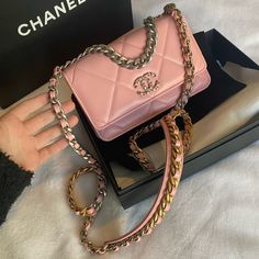 Chanel 19 Wallet On Chain In Brand New Condition Never Used! Authenticated By Poshmark Upon Purchase Comes With Box, Dust Bag, Dust Cover, And Bag Free Shipping Pink Leather With Gold/Silver Hardware I Answer All And Any Questions Asked! Pictures Are Taken Before Each Item Is Sent To Buyer To Insure Honesty Between Sales! Thank You For Checking Out My Closet Chanel Bags For Sale, High-end Pink Shoulder Bag With Detachable Strap, High-end Pink Shoulder Bag, High-end Pink Crossbody Shoulder Bag, Pink Rectangular Bag, Pink Rectangular Shoulder Bag For Everyday Luxury, Designer Pink Shoulder Bag For Everyday Luxury, High-end Pink Rectangular Bag, High-end Pink Formal Bags