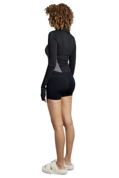 This jacket is a fusion of athleticism and sleek design, perfect for a range of activities from casual wear to light workouts. It’s a fitted, long-sleeved piece that emphasizes a streamlined silhouette with its contrast paneling. The fabric is stretchable blend, which provides both comfort and a flattering fit. The jacket features a full-zip front, which makes it convenient for layering and temperature control. Additionally, the high collar adds both warmth and style. Sleek Nylon Activewear For Sports, Sleek Nylon Sports Activewear, Sleek Fitted Activewear For Workout, Technical Long Sleeve Activewear For Winter, Fitted Go-dry Top For Winter, Sleek Nylon Workout Activewear, Functional Fitted Activewear For Fall, Functional Fitted Fall Activewear, Sleek Fitted Activewear For Sports