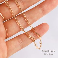 This gold paperclip chain necklace will be your new go-to necklace! We love to wear this minimalist necklace with other necklaces to layer or alone as a statement necklace! You can also wear it as a choker necklace in a shorter length. Gold filled necklace Nickel-free Choose from 2 styles of chains Small Link Chain: Link Size - 2.5 x 6 mm Spring ring Large Link Chain: Link Size - 3.7 x 13.2 mm Lobster claw No jump ring attached Simple Paperclip Chain Necklace As Gift, Simple Paperclip Chain Necklace Gift, Everyday 14k Gold Filled Paperclip Chain Necklace, Minimalist 14k Gold Filled Paperclip Chain Jewelry, Minimalist Paperclip Chain Necklace As Gift, Minimalist Paperclip Chain Necklace For Gift, Minimalist Paperclip Chain Necklace Gift, Simple Everyday Paperclip Chain Jewelry, Minimalist Paperclip Necklace As Gift