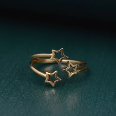 Three Star Ring, Dainty Ring, Adjustable Ring, Open Ring, Minimalist Ring, gift for her, unique ring, good luck ring, promise ring, boho ring Metal:- Brass ✦ Our rings are made of high-quality Brass metal and are carefully crafted by hand in our family workshop. The brass metal will develop a nice antique color over time. So, I suggest cleaning it once in a while for getting back to the shiny original color. You can use natural ingredients like lemon or vinegar with water to clean it. Also, appl Golden Star Jewelry, Star Promise Rings, Space Aesthetic Accessories, Cute Small Rings, Star Themed Accessories, Gold Star Accessories, Star Ring Aesthetic, Gold Celestial Jewelry, Adjustable Gold Star-shaped Rings