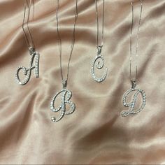 Silver Initial Necklaces With Rhinestones. Has A Lobster Clasp For Adjustment. Also Available In Gold For Certain Letters Only. Approx Length: 22 S Necklace Initial, B Initial Necklace, A Initial Necklace, Denver Trip, Silver Initial Necklace, Initial Necklace Silver, Gold Lariat Necklace, Pretty Accessories, Diamond Initial Necklace