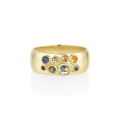 This unique cigar band features 8 bezel set Montana sapphire cabochons. With variying hues and gemstone sizes, this one-of-a-kind piece is the perfect right hand statement ring. Please note resizing this ring adds an extra 7-10 days for delivery. About the Kaleidoscope Collection:Inspired by a kaleidoscope Jillian's grandfather had when she was a kid, this collection is an ode to color and shapes. Representative of how the shapes and colors intertwine when looking through the lens of a kaleidosc Gemstone Setting, Rose Gold Jewellery, Ring Inspo, Montana Sapphire, Shapes And Colors, Rose Gold Jewelry, Dream Jewelry, Perfect Ring, All That Glitters