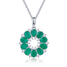 Introducing our Round Emerald Necklace Silver, a stunning piece of jewelry perfect for gifting on special occasions like birthdays, anniversaries, or as a thoughtful present for your wife. This exquisite necklace features a captivating circular pendant design. At its center lies a circle of tiny white zircon stones, delicately set in prong settings to enhance their brilliance. Surrounding this inner circle are ten natural Zambian emerald gemstones, each showcasing their vibrant green hue in a 4 by 3 prong setting formation. Completing the design is another circle white zircon stones, adding a touch of elegance and sparkle to the pendant. The combination of the lush green emeralds and the shimmering white zircon accents creates a mesmerizing and eye-catching look. Crafted with high-quality Luxury Green Round Pendant Jewelry, Cubic Zirconia Necklace For Anniversary, May Birthstone, Cubic Zirconia Anniversary Necklace For May Birthstone, White Gold Necklaces With Stones For Anniversary, Diamond Necklace For May Birthstone As Gift, Diamond Necklace Gift For May Birthstone, Anniversary White Gold Necklaces With Stones, Anniversary White Gold Necklace With Stones, Dazzling Necklaces With Stones For Anniversary