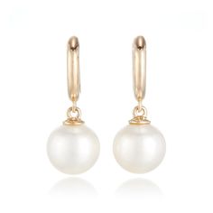 Our exclusive earrings feature white freshwater pearls playfully dangling from yellow gold huggie hoops. Since 1861, Gump's has been a destination for distinctive jewelry that offers a lifetime of enjoyment. To ensure each piece is created to our exacting standards, our expert in-house jewelry team oversees every step of the production process. The result is a statement of pure elegance. White freshwater cultured pearls, 9mm. 14-karat yellow gold. Pierced only. 1" long. Exclusive Earrings, White Pearl Earrings, White Pearl Earring, Pure Elegance, White Freshwater Pearl, Freshwater Cultured Pearls, Timeless Accessories, Huggie Hoop Earrings, Pearl Size