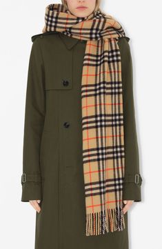 Iconic checks bring Burberry heritage to this hooded fringe scarf made from sumptuous cashmere that's washed in spring water, then brushed for luxurious softness. 39" length, 12" width 5" fringe Fixed hood 100% cashmere Dry clean Made in the UK Burberry Style, Thomas Burberry, Hooded Scarf, Fringe Scarf, Spring Water, Fringe Trim, Heritage Brands, Free Fabric, Cashmere Scarf