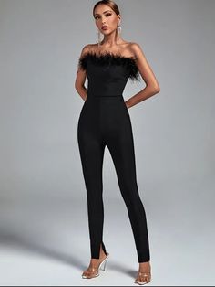 Designed with captivating elegance, our Noir Feather Fantasy Jumpsuit is perfect for those with a taste for sophistication. Its body-hugging silhouette and halter neck design accentuate your curves for a chic look, while the deep black hue and intricate feather detailing add a touch of sophistication. Ready for any night out, this jumpsuit promises to be a showstopper. Designed by Thekittenpark Party Jumpsuits And Rompers With High Stretch, High Stretch Solid Jumpsuit For Party, Party Solid High Stretch Jumpsuits And Rompers, Party Wear High Stretch Solid Jumpsuits And Rompers, High Stretch Solid Color Party Jumpsuit, Elegant Sleeveless High Stretch Jumpsuits And Rompers, Elegant Sleeveless High Stretch Jumpsuit, Backless Bodysuit For Evening, Solid Color Backless Bodysuit For Evening