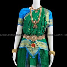 Design by Classical Dance Jewelry® ❥ Traditional Bharatanatyam costume wore during regular dance programs or arrangetram performance. ❥ Material : Art Silk ❥ Type : Traditional pant costume ❥ Easy to wear ❥ Layer front fan ❥❥❥❥ Dress Measurements in inches ( all the measurements approximately 1 margin buffer) ❥ PANT MEASUREMENTS: ☛ Pant Length: 36-38 inch ☛ Pant Waist: 35-36 inch ☛ Pant Hip: 37-38 ❥ BLOUSE MEASUREMENTS: ☛ Blouse length: 14 inch ☛ Blouse Shoulder length: 15 -16 inch ☛ Blouse arou Ceremonial Green Saree Set, Green Ceremonial Sets For Festivals, Green Temple Jewelry Style Saree For Puja, Ceremonial Green Paithani Silk Traditional Wear, Green Paithani Silk Traditional Wear For Ceremonial Occasions, Green Paithani Silk Traditional Wear For Ceremonial, Festive Green Traditional Wear With Temple Jewelry, Green Temple Jewelry Sets For Festive Occasions, Festive Green Temple Jewelry Sets