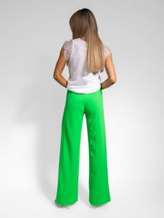 These trousers feature: Straight leg Wide leg fit High Waist Elasticated waist band Pull up - no zips or buttons Summer Stretch Wide Leg Elastane Pants, Stretch Wide Leg Elastane Pants For Summer, Stretch Elastane Wide Leg Pants For Summer, Summer High-waisted Stretch Dress Pants, Stretch Summer Dress Pants In High-waisted Style, Green Stretch Wide Leg Pants For Spring, Spring Stretch Harem Pants, Green Trousers For Spring, Stretch High-waisted Dress Pants For Summer