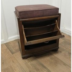 a brown leather storage box on the floor