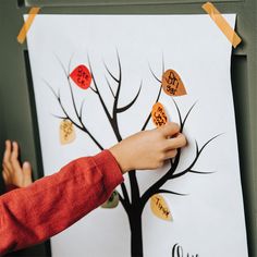 "This thankful tree is a perfect thanksgiving tradition or fun activity for the month of November (or really any time of the year!) Write the things you are grateful for on each leaf and then stick them on to the tree. The goal is to have a full tree of leaves filled with all the things you have to be grateful for. You will receive: One 18\" x 24\" poster printed on 20 lb white paper. 3 Sheets of Matte Stickers (18 stickers per page, total 54 stickers). *Washi tape not included. PRODUCT DETAILS Thankful Tree Printable, Halloween Handout, Gratitude Tree, Fun Thanksgiving Crafts, Thanksgiving Poster, Thankful Tree, Tree Poster, Halloween Preschool, Therapeutic Art