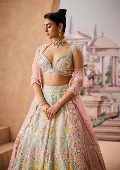 Step into refined elegance with this mint lehenga, featuring stunning 3d floral detailing. Embellished with sequins and resham embroidery, this ensemble offers a perfect blend of sophistication and charm, making it an ideal choice for those seeking a graceful and unique look. Georgette Lehenga With Floral Embroidery For Reception, Elegant Floral Embroidered Georgette Choli, Wedding Palazzo Set With Floral Embroidery, Diwali Reception Lehenga With Floral Embroidery, Designer Anarkali Lehenga With Floral Embroidery, Party Wear Floral Embroidered Floor-length Lehenga, Party Wear Floor-length Lehenga With Floral Embroidery, Anarkali Georgette Lehenga With Floral Embroidery, Organza Choli With Floral Embroidery For Party