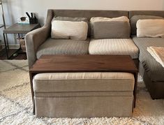 a couch and ottoman in a living room