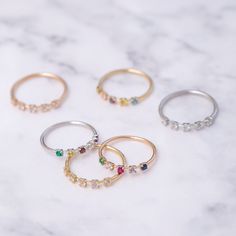 14K Golden Design Birthstone Ring, Colored Stone Ring and Minimal Ring, Delicate Gold Ring & Multicolor Ring Elegant Ring / Everyday Ring / Zircon Ring / Mom Ring / Colorful Ring / Multicolor Ring / Special Ring / Cute Ring You may write the birthstones as order note or via convo as follows: Choose the order of the birthstones: 1. Stone: your choice 2. Stone: your choice 3. Stone: your choice 4. Stone: your choice 5. Stone: your choice Material: Solid Gold (not gold plated, not gold filled) Gold Crystal Ring With Stones For Anniversary, Anniversary Gold Crystal Ring With Stones, Gold Birthstone Ring With Cubic Zirconia, Gold Sterling Silver Birthstone Ring With Accent Stones, Gold Open Ring With Gemstone Accents, Birthstone Open Ring With Gemstone Accents, Fine Jewelry Stackable Open Rings With Multi-stone, Fine Jewelry Stackable Rings With Gemstone Accents For Anniversary, Fine Jewelry Stackable Multi-stone Open Rings