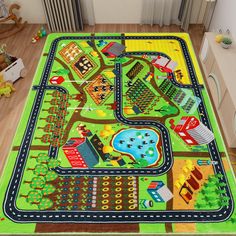 a child's play mat with cars and roads on it in the middle of a room