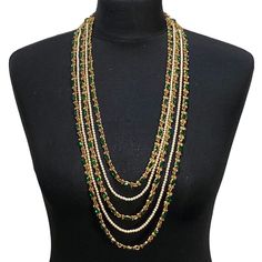 Diamonte layered mala Elegant Temple Necklace With Tilla For Parties, Bollywood Bridal Necklace With 17 Green Jewels, Kundan Jewelry With Gold Beads For Party, Multi-strand Gold Jewelry For Celebration, Green Pearl Chain Necklace For Wedding, Elegant Pearl Chain Mala For Wedding, Bollywood Style Jeweled Necklaces, Green Pearl Chain Jewelry For Wedding, Elegant Gold Mala For Celebrations