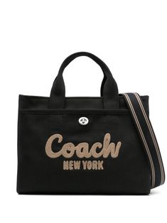 This Coach tote bag features a top zip fastening, adjustable detachable shoulder strap, two top handles, front turnlock-fastening pocket, rear press-stud fastening pocket, and a main compartment with a canvas lining. The bag also features a luggage tag with an appliqué logo and silver-tone hardware. Ootd Campus, Name Brand Purses, Brand Purses, Coach Tabby, Victoria Secret Fragrances, Treat Myself, Tas Bahu, Coach Tote Bags, Leather Crafting