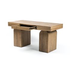 a wooden table with an open drawer on it's side and one section missing