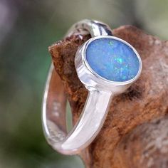 Opal solitaire ring, 'Intensity' - Handcrafted Sterling Silver and Opal Ring Opal Solitaire Ring, Paw Print Jewelry, 14k Gold Hoop Earrings, Ribbon Jewelry, Printed Jewelry, Diamond Charm, Solitaire Diamond, Opal Ring, Fine Rings