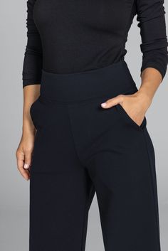 Why we love this: Step into the epitome of grace with our Black Grace Wide Leg Pant. These must-have black dress pants are designed for any occasion. With a super-flattering waist & roomy pockets, you’ll be dashing from desk-to-dinner with ease. Features: KiraGrace PowerStrong: Feels like cotton, keeps you dry High-rise, 32" inseam, Leg Opening: 25" Slimming high waist w/side pockets Made in U.S.A. of imported fabric Waist: High-Waisted (13" Rise) Inseam: 32" inseam, easy to hem For easy alterations - click here Leg Shape: Straight wide leg Sizing: Relaxed fit, size down if in between sizes Compression: Flowy- No compression Model, Kori, is 5'10" and wearing a size small Sleek Stretch Black Dress Pants, Sleek Black Stretch Dress Pants, Black Loose Fit Ankle-length Dress Pants, Black Wide Leg Trousers In Elastane, Sleek Black Wide Leg Pants For Business Casual, Sleek Black Ankle-length Pants, Tailored Black Wide Leg Pants In Elastane, Black High-waisted Wide Leg Pants, Tailored Black Wide Leg Elastane Pants