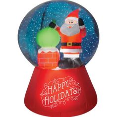 an inflatable snow globe with a santa clause and chimney on the inside, says happy holidays