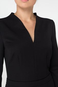 "A beautiful black dress featuring pencil silhouette, midi length and high neck collar. - Stand up collar with v-neck - Fitted pencil silhouette - Knee length (midi) - 3/4 sleeves - concealed back zipper closure Color: Black. Fiber: viscose 45%, elastane - 5%, polyester - 50% For Size S: dress length - 40\", sleeve length - 14,5\" (2/3) Our model wears size S (US 6) and is 171cm/5'6\" tall. You may feel free choosing the size. Just send us your measurements (bust, waist, hips, height). We will d Elegant V-neck Bodycon Dress For Formal Occasions, Chic V-neck Midi Dress For Business, Classic V-neck Mini Dress For Semi-formal Occasions, Chic Sheath V-neck Dress For Formal Occasions, Elegant Structured Mini Dress For Party, Formal V-neck Midi Dress, Black Fitted V-neck Dress For Formal Occasions, Chic V-neck Bodycon Dress For Office, Knee-length V-neck Dress For Office