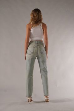 DESCRIPTIONThe Ex-Boyfriend is back and better with our newest wash— Rickie. This vintage-inspired, light wash is the perfect addition to everyone’s closet. The Ex-Boyfriend is a wedgie fit featuring a fitted waist and a straight leg bottom that flatters your bum while elongating your legs. DETAILSHigh-Rise Style Straight Leg Vintage Wash Button Fly 30" Inseam14" Leg Opening100% Cotton Model is 5'7 wearing size 24. CRAFTED BY HAND, JUST FOR YOU Size up if measurements are in between sizes. Dark Wash Stonewashed Bottoms For Spring, Spring Dark Wash Stonewashed Bottoms, Spring Stonewashed Dark Wash Bottoms, Soft-washed Denim Jeans For Spring, Spring Soft-washed Denim Jeans, Trendy Acid Wash Soft-washed Bottoms, Soft-washed Relaxed Fit Jeans For Spring, Everyday Fitted Distressed Jeans, Fitted Distressed Jeans For Everyday Wear