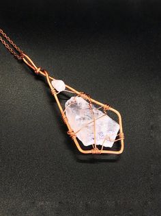 This is a stunning light pink colored pendant. It is made of a tumbled raw stone of rose quartz and rose quartz bead in Scythian tribal style. The stone length is around 2.5 inch, after wrapping it's about 4.5 inches with bail. I've wrapped it in copper wire in unique pattern. It comes with a copper chain 23 inches long.Rose Quartz purifies and opens the heart at all levels to promote love, self-love, friendship, deep inner healing and feelings of peace. Calming and reassuring, it helps to comfo Rose Quartz Pendant Necklaces For Healing, Rose Quartz Pendant Necklace For Healing, Rose Quartz Gemstone Pendant Jewelry, Handmade Rose Quartz Jewelry For Healing, Rose Quartz Necklaces With Natural Stones For Healing, Rose Quartz Gemstone Pendant Necklace, Rose Quartz Pendant Necklace With Gemstones, Handmade Spiritual Rose Quartz Jewelry, Healing Rose Quartz Gemstone Necklace