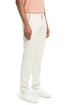 A casual alternative to business-only flat-front styles, these pants are made from comfortable stretch-cotton and tailored in a versatile straight-leg profile. 34" inseam; 14" leg opening 98% cotton, 2% elastane Machine wash, line dry Made in Portugal Straight Fit Pants With Five Pockets, Straight Silhouette Cotton Bottoms For Workwear, Cotton Straight Silhouette Bottoms For Work, Cotton Bottoms With Straight Silhouette For Work, Relaxed Fit Straight Leg Chino Dress Pants, Straight Fit Cotton Bottoms With Straight Silhouette, Straight Silhouette Cotton Bottoms With Five Pockets, Cotton Bottoms With Five Pockets In Straight Silhouette, Slim Fit Chinos With Straight Hem For Spring