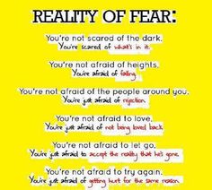 a yellow poster with some words written in different languages and the caption reads reality of fear