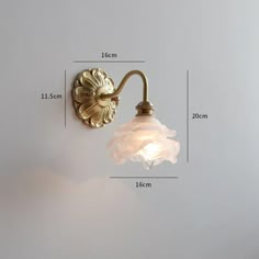 an image of a wall light with measurements