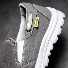 Breathable Casual Slip-ons For Outdoor, Casual Non-slip Slip-on Canvas Shoes, Breathable Synthetic Slip-on Canvas Shoes, Outdoor Gray Cushioned Slip-on Sneakers, Casual Slip-on Sneakers With Non-slip Round Toe, Casual Non-slip Slip-on Sneakers With Round Toe, Casual Round Toe Slip-ons For Outdoor, Casual Gray Breathable Slip-on Sneakers, Casual Wear-resistant Sneakers With Round Toe