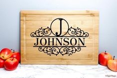 personalized cutting board with apples on the counter