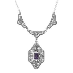 This is a true to period art deco style Sterling Silver Amethyst Filigree Necklace measures 19 inches in length. The filigree Amethyst pendant portion measures approx. 1 1/4 inches H x 3/4 inches W. Total hanging length of pendant is approx. 1 7/8 inches. The piece is absolutely beautiful. The necklace also comes with an easy-to-use strong trigger clasp (lobster claw). This is a great example of a period piece and would be a great addition to your Art Deco / Victorian collection.  Thanks for looking and if you have any questions, always feel free to ask :). fn215am Luxury Art Deco Filigree Necklace, Formal Art Nouveau Necklace, Art Deco Gemstone Necklace For Anniversary, Classic Amethyst Necklaces For Wedding, Purple Art Deco Necklace For Gift, Art Nouveau Gemstone Necklace For Formal Occasions, Art Nouveau Gemstone Necklaces For Formal Occasions, Art Deco Pendant Necklace With Intricate Design, Art Nouveau Filigree Necklace For Anniversary