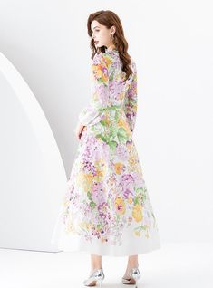 "Bloom into elegance with this pastel-hued masterpiece, a dress that intertwines the gentleness of a spring garden with the grace of high fashion. Boasting an ethereal array of floral designs, this piece is a sartorial tribute to the tender beauty of nature. Its full-length sleeves and high mandarin collar lend a vintage touch, while the fitted waist—highlighted by a delicate belt—creates a flattering silhouette. Crafted from a lightweight, flowing fabric, the dress moves with a dreamlike quality. The soft palette of pinks, greens, and lilacs paints a picture of serene loveliness, perfect for garden parties, springtime weddings, or simply when one wishes to carry the freshness of spring wherever they go." Fabric name: chiffonPattern: printingSkirt length: long skirtSkirt type: flounce skir Elegant A-line Floral Dress For Spring, Spring Floral Embroidered A-line Maxi Dress, Elegant Spring Floral Print Midi Dress, Elegant Floral Print Midi Dress For Spring, Spring Feminine A-line Dress, Feminine A-line Spring Dress, Elegant Floral Print Spring Dress, Spring Feminine Dress With Floral Embroidery, Feminine Spring Maxi Dress