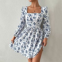 Step into timeless elegance with the Blue Blossom Square Neck Dress, featuring a delicate floral pattern and flattering square neckline. The long sleeves and flowing skirt make it perfect for both casual outings and special occasions. Specs: Material: Polyester Blue Blossom, Plaid Pullover, Dress Autumn, Square Neck Dress, Flowing Skirt, Vacation Dresses, Corset Style, Cutout Dress, Elegant Dress