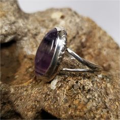 Sterling Silver Floriet ring is made by Old Hippie Dave in Safety Harbor, Florida. Each one is hand fabricated out of 925 sterling silver and hand polished.stone is 14x18 mm band is double 16 gage. Because this ring is handmade no 2 rings or stones are ever exactly the same. Handmade Amethyst Ring For Anniversary, Handmade Amethyst Anniversary Ring, Artisan Sterling Silver Oval Rings, Handmade Sterling Silver Gemstones For Anniversary, Handmade Oval Amethyst Ring For Anniversary, Adjustable Amethyst Sterling Silver Ring For Anniversary, Handmade Oval Gemstones For Anniversary, Sterling Silver Rings With Natural Stones For Gift, Sterling Silver Amethyst Ring With Polished Finish For Anniversary