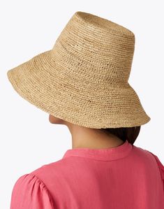 Perfect for keeping the UV rays away in style, Seventy's hat is the ideal accessory for the new season. It's crafted from raffia to a bucket silhouette that pairs perfectly with breezy dresses and beachy separates alike. Wear yours atop all of your favorite warm weather ensembles for a charming look you're sure to love. Chic Natural Bucket Sun Hat, Lightweight Wide Brim Cloche Hat For Vacation, Woven Cloche Hat For Summer, Woven Bucket Hat With Short Brim For Warm Weather, Lightweight Flat Brim Cloche Hat For Vacation, Vacation Lightweight Cloche Hat With Flat Brim, Lightweight Cloche Hat With Flat Brim For Vacation, Chic Wide Brim Bucket Hat In Natural Color, Chic Natural Straw Bucket Hat