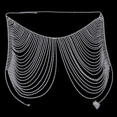 Suitable for the crowd: all women Material: Rhinestone Applicable occasions: parties, clubs, weddings, daily, engagement, anniversaries, nightclubs, gift giving, etc. This multi-layered fringed body chest chain is a luxurious costume body jewelry perfect for all kinds of rave party events Glamorous Silver Body Jewelry For Party, Silver Rhinestone Crystal Necklace For Festival, Bohemian Party Body Jewelry Choker, Bohemian Body Jewelry Choker For Party, Festival Rhinestone Necklace, Party Body Jewelry With Bling And Crystal, Silver Crystal Waist Chain For Party, Crystal Body Jewelry With Rhinestones For Parties, Glamorous Silver Body Chain For Party