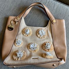 Cute Nine West Flower Handbag Tote Bag Purse Nine West Flower Tote Cute And In Excellent Like New Condition. No Rips, No Tears, No Stains. Never End Up Using It. Comes From Smoke Free Home. Beautiful 3d Flowers Detail Bag! Beige Pouch Shoulder Bag With Handles, Spring Brown Hobo Bag With Double Handle, Beige Hobo Bag With Removable Pouch For Spring, Neutral Tote Bag With Detachable Handle, Brown Double Handle Hobo Bag For Spring, Spring Shoulder Bag With Removable Pouch In Natural Color, Neutral Tote Shoulder Bag With Detachable Handle, Spring Beige Shoulder Bag With Leather Handles, Spring Brown Top Handle Hobo Bag