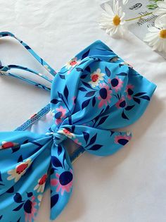 Sku CY-!65936 Material Polyester Lining Polyester Underwired No Feature Floral Printed , Bowknot Neckline Spaghetti-neck Occasion Vacation , Beach , Hot Springs , Swimming Pool Seasons Spring , Summer Type Bikini Swimsuit Color BLUE Size S,M,L Please consult the size chart we provide for this item's measurements to help you decide which size to buy.Please note: There may be 1-3cm differ due to manual measurement.CMINCH Cup Bust Waist Hips S A-B 80-85 61-66 86-91 M B-C 85-90 66-71 91-96 L C-D/E 90-95 71-76 96-101 Blue Swimsuit, Pocket Jacket, Vacation Beach, Sequin Top, Metal Buttons, Hot Springs, Floral Printed, Swimming Pool, Types Of Sleeves