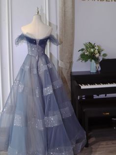 Blue Tulle Ball Gown For Homecoming, Blue Tulle Gown For Homecoming, Blue Tulle Ball Gown For Prom, Off-shoulder Tulle Ball Gown For Gala, Blue Off-shoulder Gown For Prom, Off-shoulder Tulle Gown For Formal Occasions, Blue Tulle Evening Dress For Prom, Off-shoulder Tulle Evening Dress For Gala, Off-shoulder Tulle Evening Dress For Debutante Ball