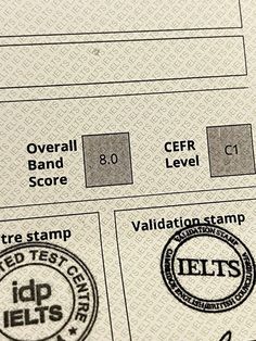 several different stamped items are displayed on a computer screen, including an id badge