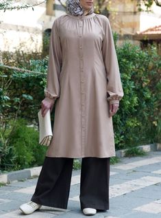 Modal Zumurruda Tunic New Modal Top Design, Tunic Hijab Style, Fashion Dresses Formal, Tunic Designs, Muslim Fashion Dress, Simple Pakistani Dresses, Muslim Fashion Outfits, Most Beautiful Dresses, Women Tunic Tops