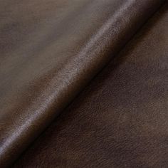 a brown leather textured upholster