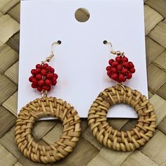 Woven Rattan Round Drop Earrings with Red Beads Discover our Woven Rattan Round Drop Earrings with Red Beads, perfect for a boho chic look. These unique earrings add a stylish touch to any outfit. Order now for fast shipping! Product Description: Enhance your jewelry collection with our Woven Rattan Round Drop Earrings with Red Beads. These stunning earrings combine natural woven rattan with vibrant red beads, creating a unique and fashionable statement piece. Ideal for adding a touch of natural Red Round Beads Jewelry For Vacation, Wooden Beads Earrings For Beach, Wooden Beaded Earrings For Beach, Handmade Red Hoop Earrings For Beach, Beach Wooden Bead Earrings, Red Hoop Earrings For Summer Beach, Handmade Red Earrings For Vacation, Red Beaded Earrings With Dangling Beads For Beach, Red Bohemian Hoop Earrings For Summer