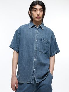 This is a comfortable and modern shirt that is made out of high quality cotton 100% fabric. With design detail of bio washed and salt washed fabric that has a soft touch, it gives a trendy and refined look.- Oversized silhouette- Bio washed and salt washed fabric- Color contrasting stitches detail Classic Denim Tops Pre-washed, Casual Relaxed Fit Denim Top Made Of Tencel, Classic Pre-washed Denim Tops, Medium Wash Relaxed Fit Button-up Shirt, Relaxed Fit Light Wash Chambray Denim Top, Washed Blue Cotton Button-up Denim Top, Relaxed Fit Washed Tencel Tops, Pre-washed Cotton Button-up Shirt, Casual Light Wash Tencel Tops