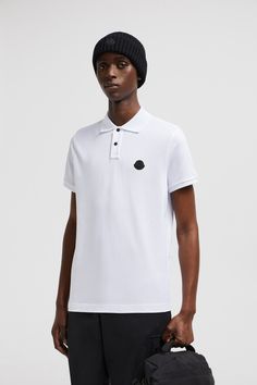 A timeless design that transcends seasons, this polo shirt is crafted from cotton piqué. The classic style is embellished with a Moncler logo patch on the chest. Designer Cotton Tops With Ribbed Collar, Designer Cotton Polo Shirt, Luxury Cotton Short Sleeve Polo Shirt, Designer Collared Cotton Polo Shirt, Luxury Cotton Polo Shirt, Luxury Cotton Polo Collar Top, Luxury Cotton Top With Polo Collar, Personalized Jacket, Moncler Logo