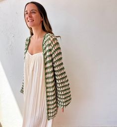 This handmade long sleeve cardigan is Made by colorful and very soft pure organic cotton, with crew neckline. This green and beige crochet cardigan sweater has the perfect color combination besides it fits perfectly to your body due to the cotton is made of. WHICH IS MY SIZE? In order to know which is the perfect size for you, you just have to measure your chest . Below, you can find the measurements referred to every size: Size XS: 76 cm/ 29,5 in.  Size S: 80 cm/ 31,4 in. Size M: 90 cm/ 35,4 in Cotton Open Knit Cardigan For Layering, Beige Cotton Open Knit Cardigan, Green Cotton Long Sleeve Cardigan, Green Cotton Cardigan For Fall, Green Cotton Sweater For Spring, Green Layering Sweater For Spring, Green Long Sleeve Open Knit Outerwear, Spring Green Cotton Sweater, Green Knit Cardigan For Layering